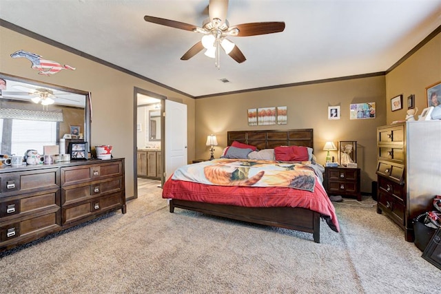 bedroom featuring ornamental molding, light colored carpet, and visible vents