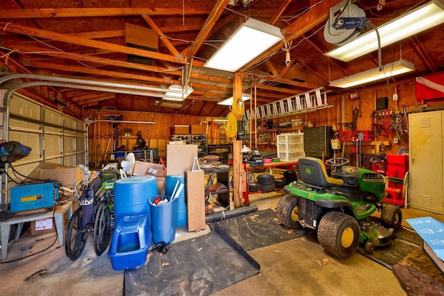 garage featuring a workshop area