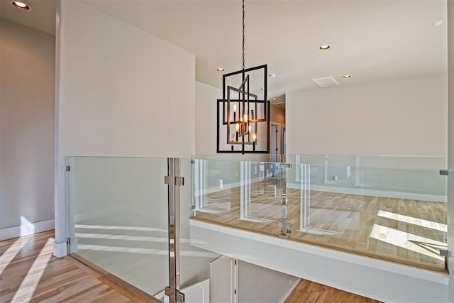 bathroom with hardwood / wood-style flooring