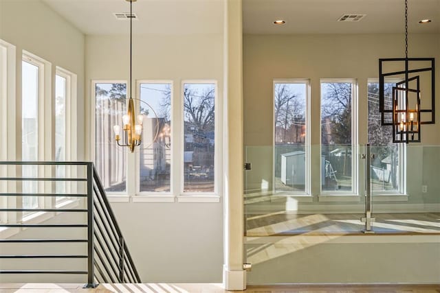 interior space featuring a notable chandelier