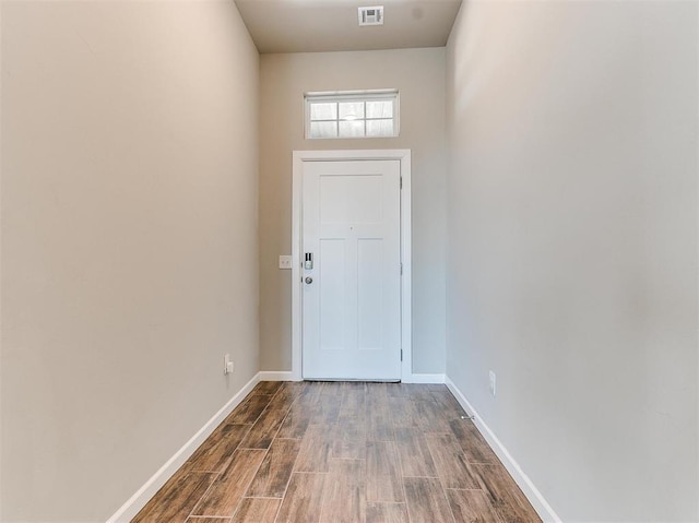 doorway featuring hardwood / wood-style flooring