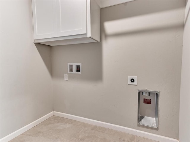 laundry room featuring cabinets, hookup for an electric dryer, and washer hookup