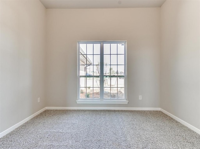 spare room featuring carpet flooring