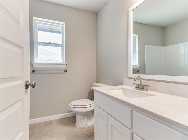 bathroom with a shower, toilet, tile patterned flooring, and vanity