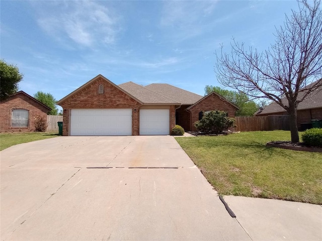8016 Heather Glen Dr, Yukon, OK 73099 - single story home featuring concrete driveway, brick siding, fence, and a front yard