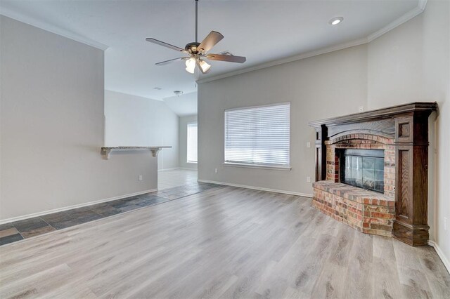 8016 Heather Glen Dr, Yukon, OK 73099 - unfurnished living room featuring baseboards, crown molding, and a fireplace