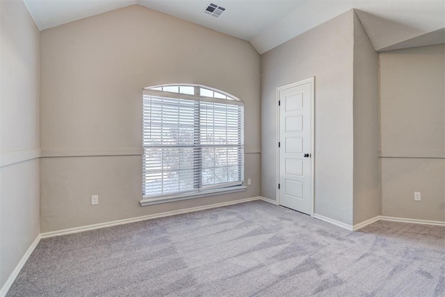 8016 Heather Glen Dr, Yukon, OK 73099 - unfurnished room with lofted ceiling, carpet flooring, visible vents, and baseboards