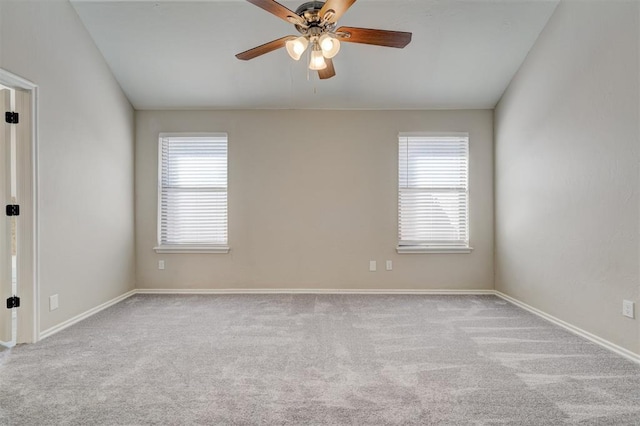 8016 Heather Glen Dr, Yukon, OK 73099 - spare room with carpet, a wealth of natural light, a ceiling fan, and baseboards
