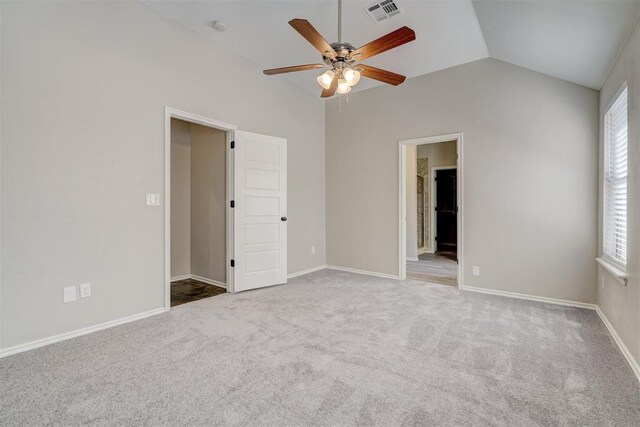8016 Heather Glen Dr, Yukon, OK 73099 - unfurnished bedroom with vaulted ceiling, multiple windows, visible vents, and carpet