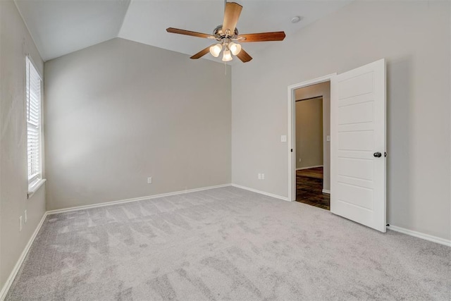 8016 Heather Glen Dr, Yukon, OK 73099 - carpeted spare room featuring lofted ceiling, a healthy amount of sunlight, baseboards, and ceiling fan