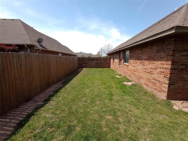 8016 Heather Glen Dr, Yukon, OK 73099 - view of yard with a fenced backyard