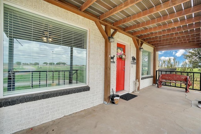 doorway to property with a porch