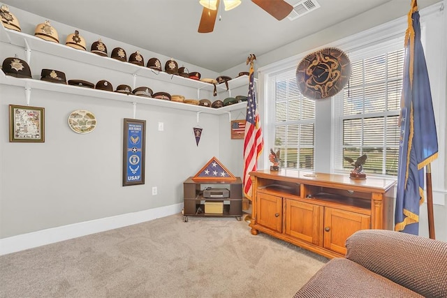 interior space featuring ceiling fan