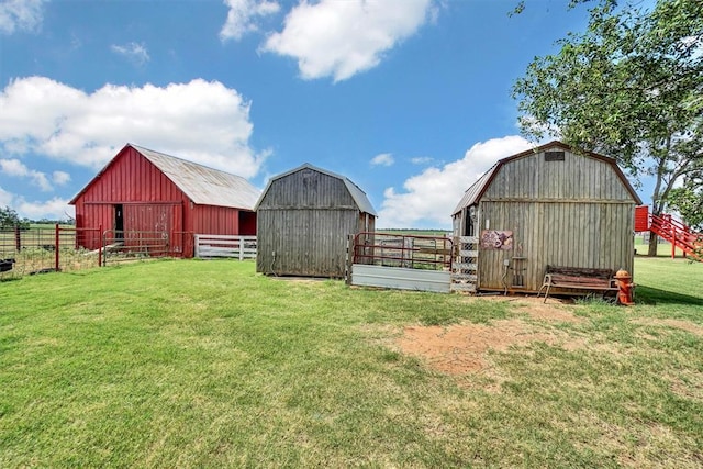 view of outbuilding featuring a yard