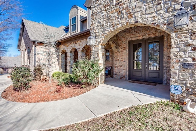 3910 Sienna Rdg, Newcastle, OK 73065 - entrance to property featuring stone siding and french doors