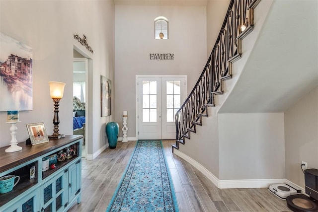 3910 Sienna Rdg, Newcastle, OK 73065 - foyer with a towering ceiling, baseboards, stairs, and light wood-type flooring