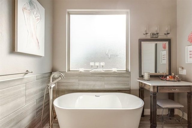 3910 Sienna Rdg, Newcastle, OK 73065 - bathroom with plenty of natural light, a freestanding bath, and tile walls