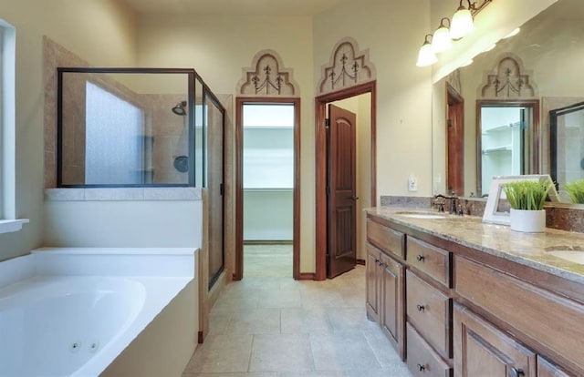 bathroom featuring plus walk in shower and vanity