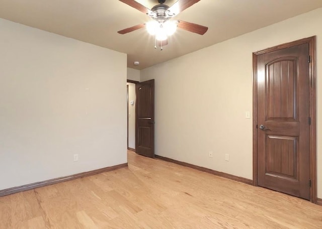 unfurnished bedroom with light hardwood / wood-style flooring and ceiling fan