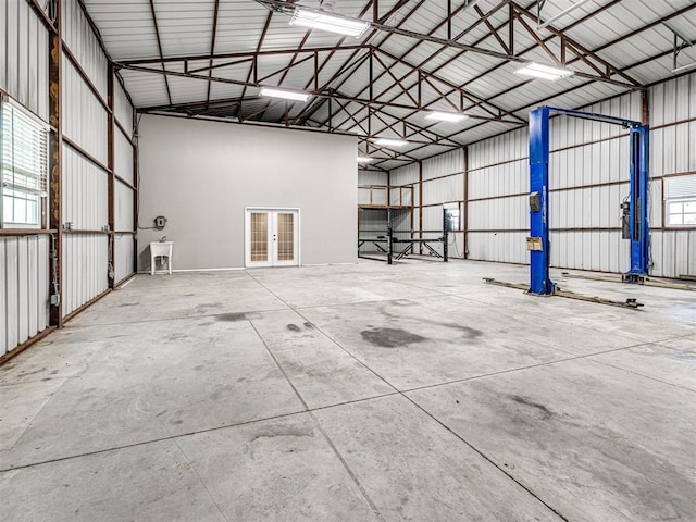 garage featuring french doors and sink