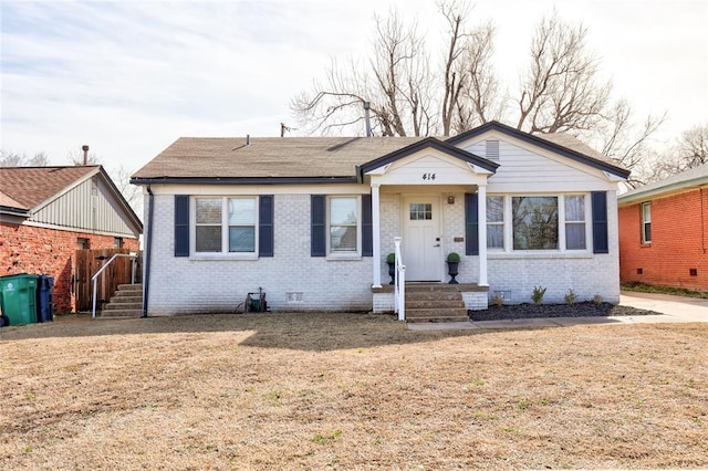 bungalow with crawl space and brick siding