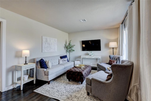 414 NW 50th St, Oklahoma City, OK 73118 - living room featuring dark wood finished floors and baseboards