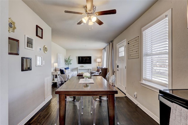 414 NW 50th St, Oklahoma City, OK 73118 - dining room featuring dark wood-style floors, baseboards, and a ceiling fan