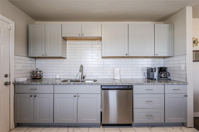 414 NW 50th St, Oklahoma City, OK 73118 - kitchen featuring stainless steel dishwasher, a sink, gray cabinets, light stone counters, and a textured ceiling