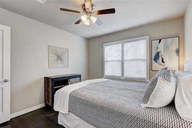 414 NW 50th St, Oklahoma City, OK 73118 - bedroom with baseboards, dark wood-style floors, and a ceiling fan