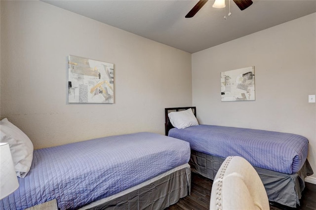 414 NW 50th St, Oklahoma City, OK 73118 - bedroom with dark wood-type flooring and a ceiling fan