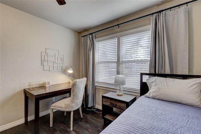414 NW 50th St, Oklahoma City, OK 73118 - bedroom featuring baseboards, dark wood-style flooring, a desk, and ceiling fan
