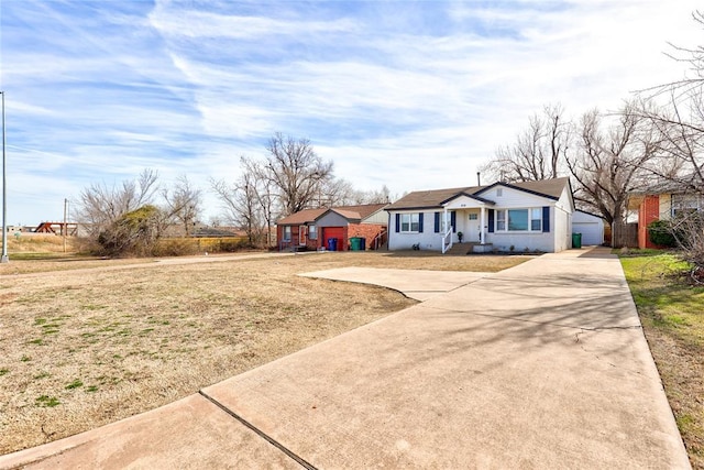 414 NW 50th St, Oklahoma City, OK 73118 - ranch-style home featuring driveway and a front yard