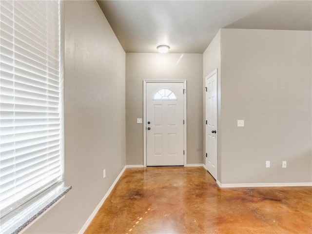 foyer featuring concrete floors