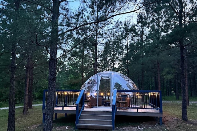 view of jungle gym featuring a wooden deck