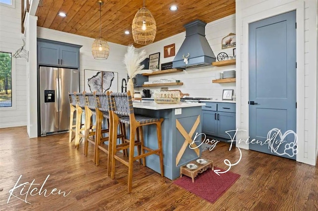 kitchen featuring wood ceiling, premium range hood, stainless steel fridge with ice dispenser, and open shelves