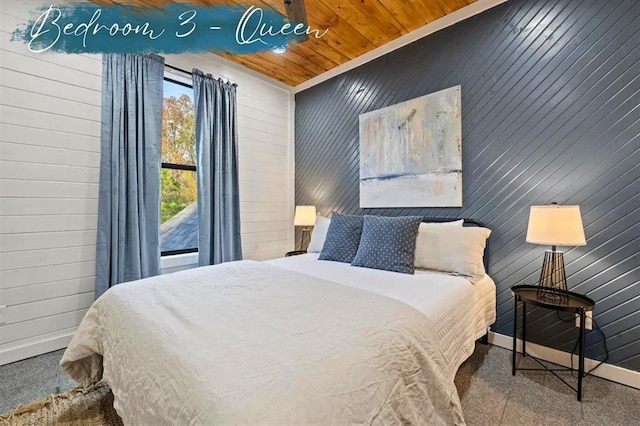 bedroom featuring wooden ceiling and baseboards