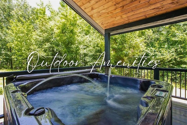 exterior space featuring a hot tub