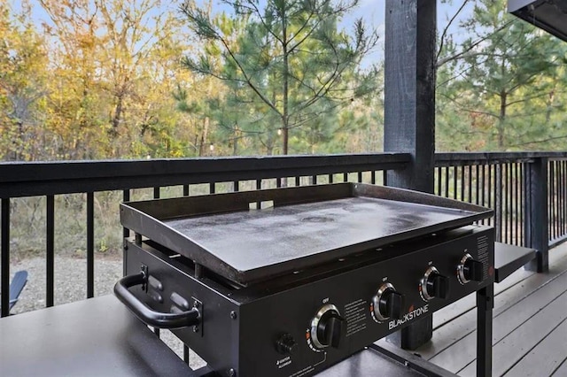 deck featuring a grill