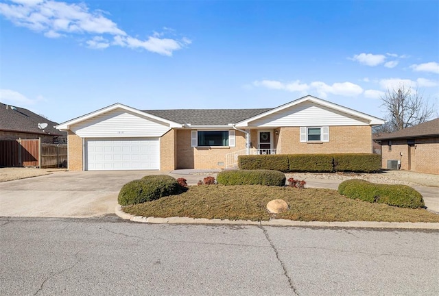 ranch-style house featuring a garage