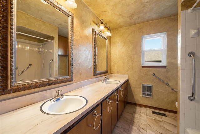 bathroom featuring walk in shower, vanity, and toilet