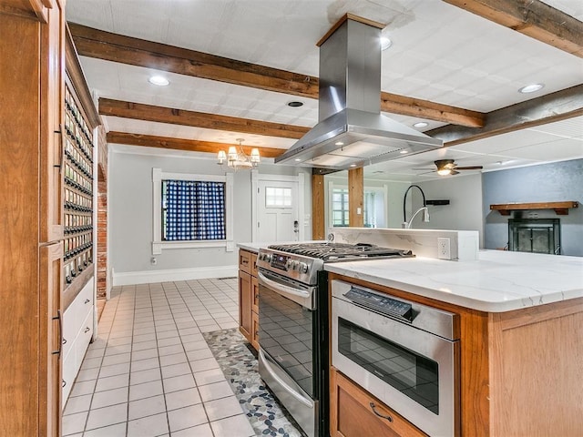 17826 240th St, Washington, OK 73093 - kitchen with stainless steel appliances, island exhaust hood, beamed ceiling, light tile patterned floors, and light stone countertops