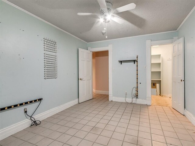 17826 240th St, Washington, OK 73093 - unfurnished bedroom with a textured ceiling, crown molding, baseboards, and ceiling fan