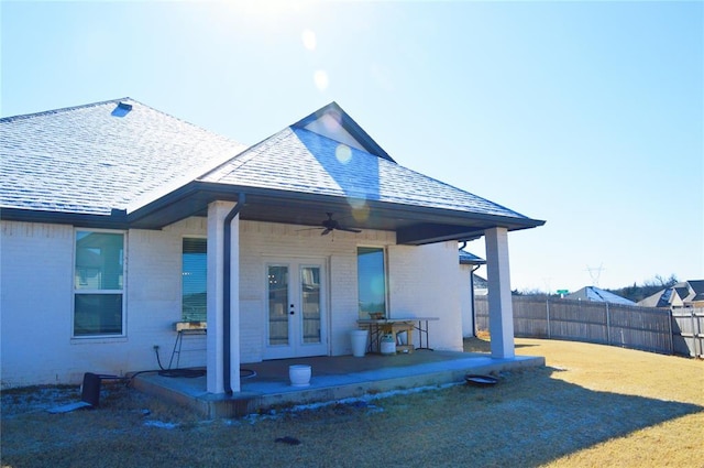 view of front of house with french doors and ceiling fan