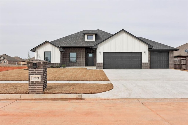 modern farmhouse style home featuring a garage