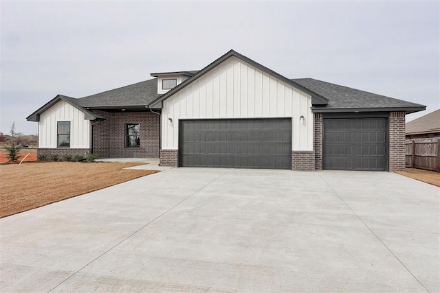 modern farmhouse featuring a garage