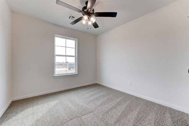 unfurnished room featuring ceiling fan and carpet flooring