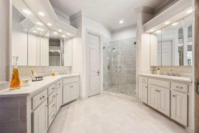 bathroom featuring a shower with door, crown molding, vanity, and decorative backsplash