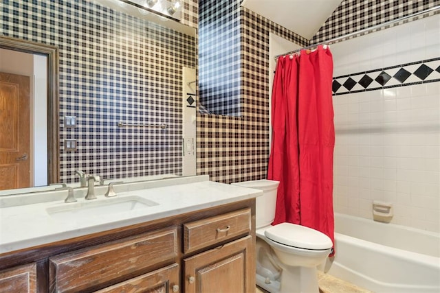 full bathroom featuring toilet, shower / bath combo, and vanity