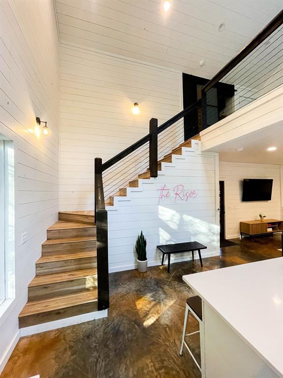 stairs with wooden walls