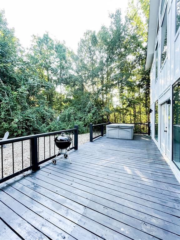 deck featuring a grill